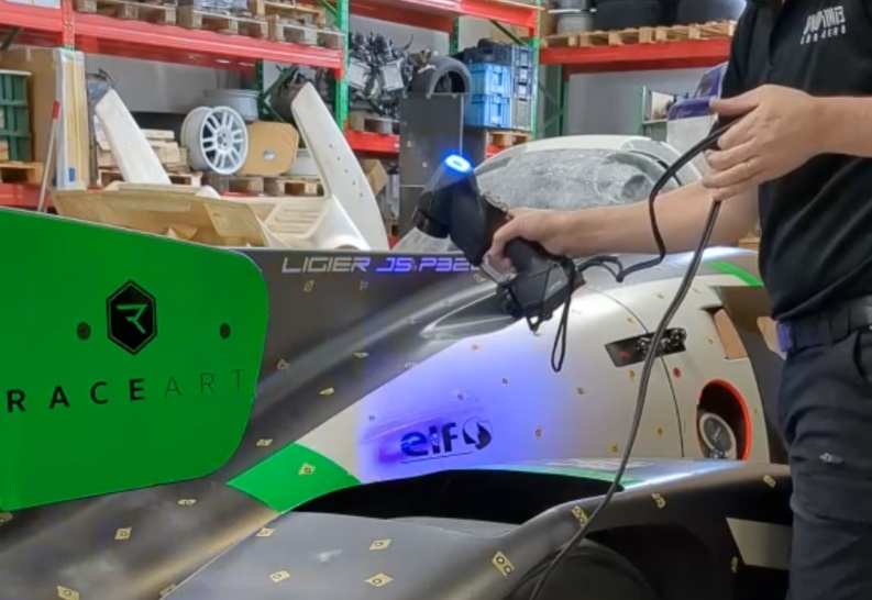 An AMB Aero technician used HandySCAN BLACK™|Elite on a race car.